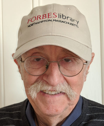 man in Forbes Library baseball cap