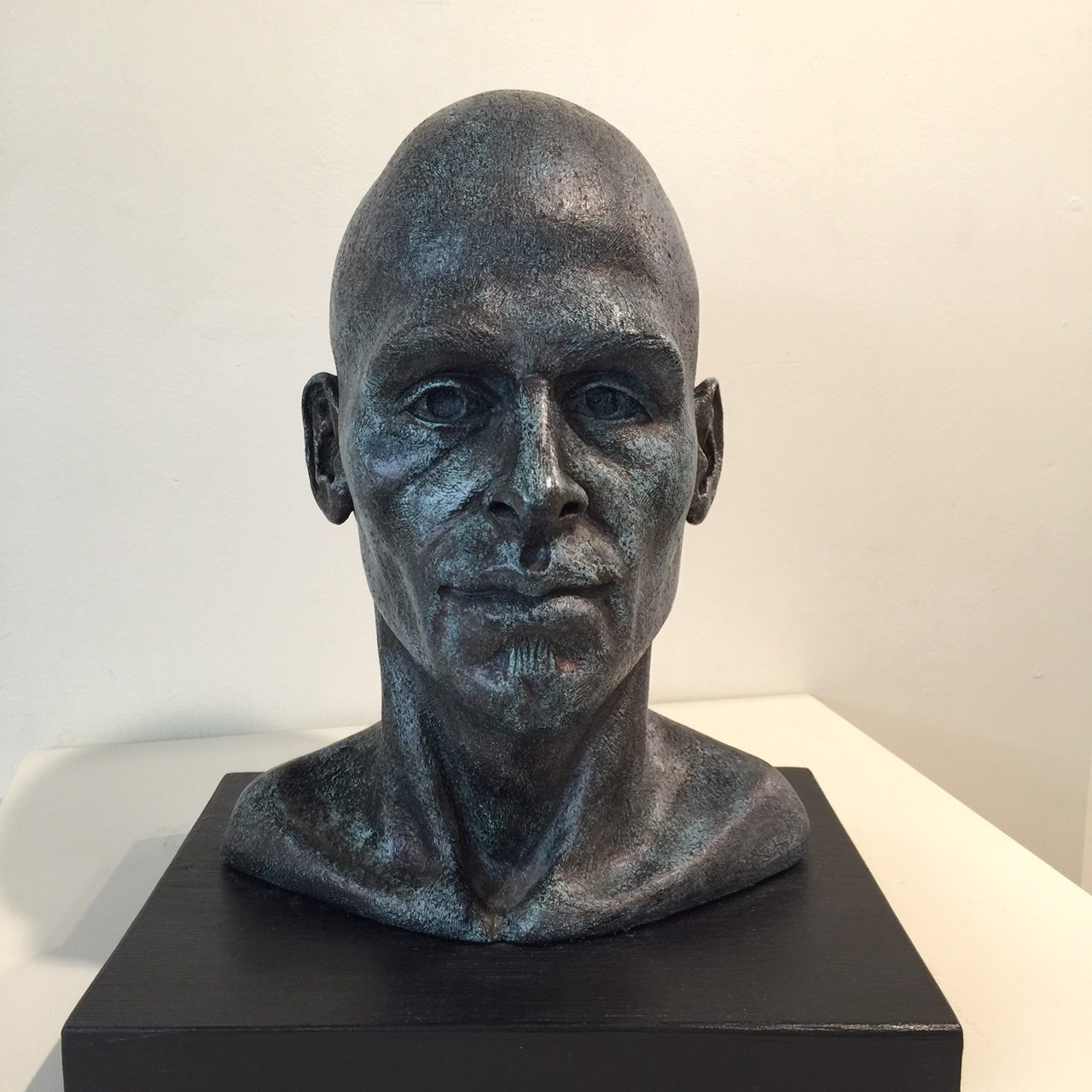 Ben, fired clay, acrylics and wax, by Viki Gable