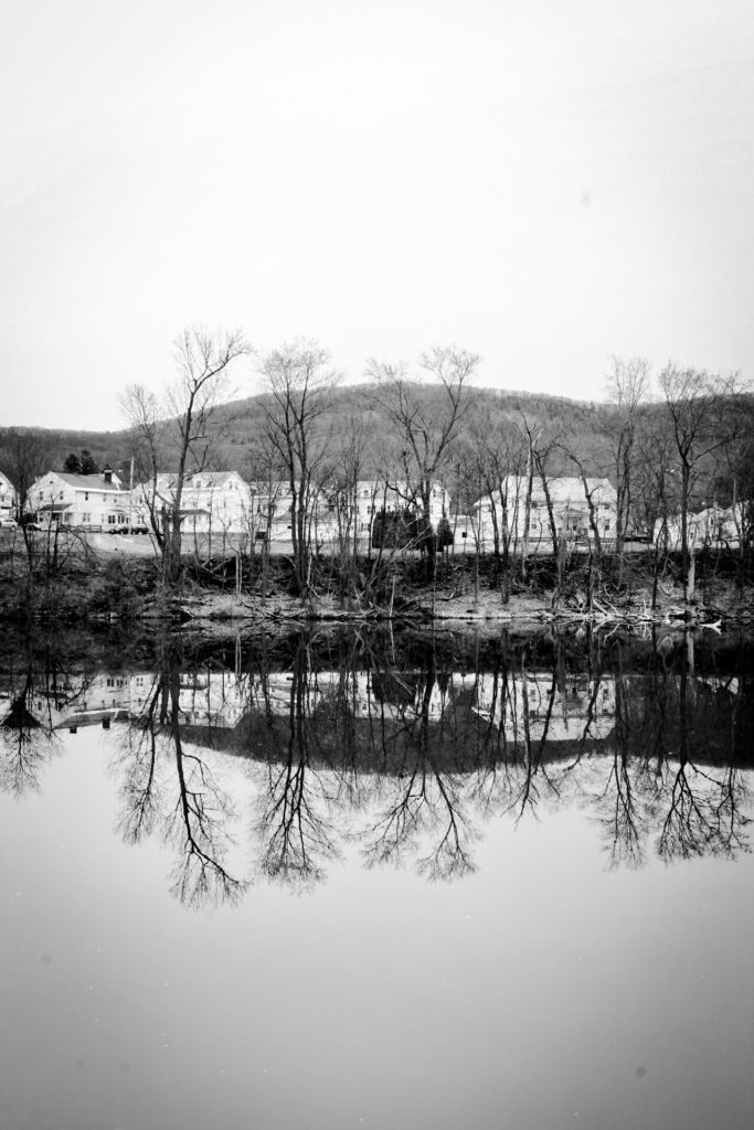 Easthampton, MA reflections , b&w photo by Jesse Merrick