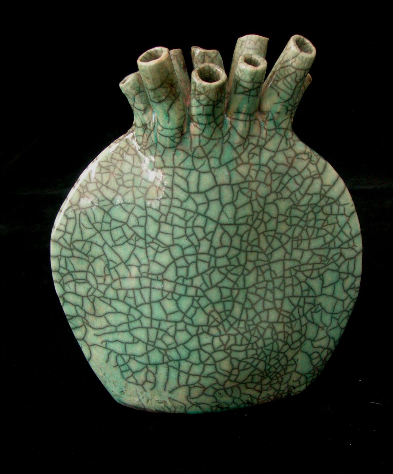 Untitled, stoneware, raku 8 x 9 x 4.5 in., by Joyce Miller