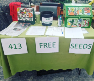 photo of 413 Free Seeds tabling at grow food Northampton seed swap